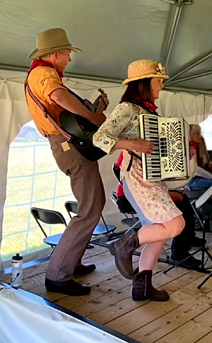 Tom and Mary Kay Aufrance on stage as Slim and Minnie