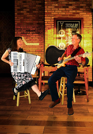 Tom and Mary Kay Aufrance perform music in the coffee shop