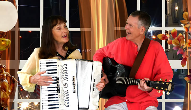 Tom and Mary Kay play accordion and guitar